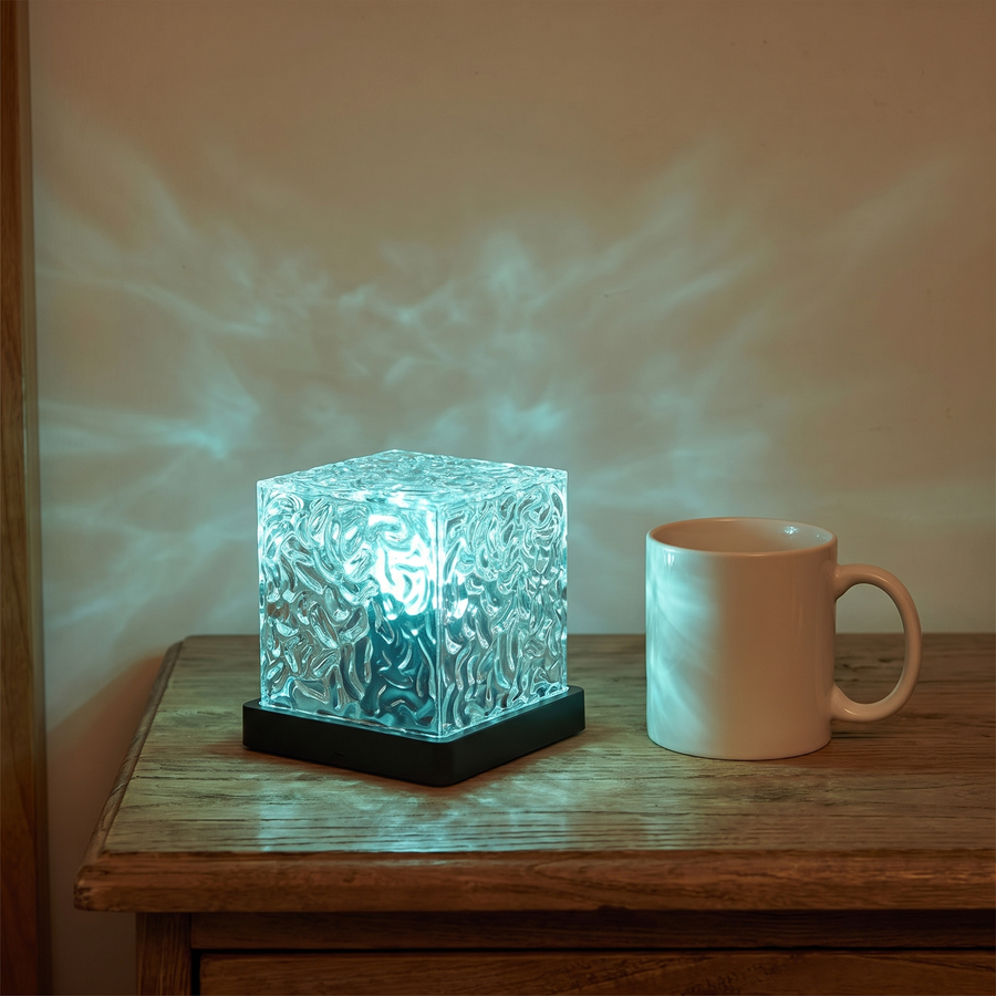 Square ripple lamp next to a coffee mug to show its real size